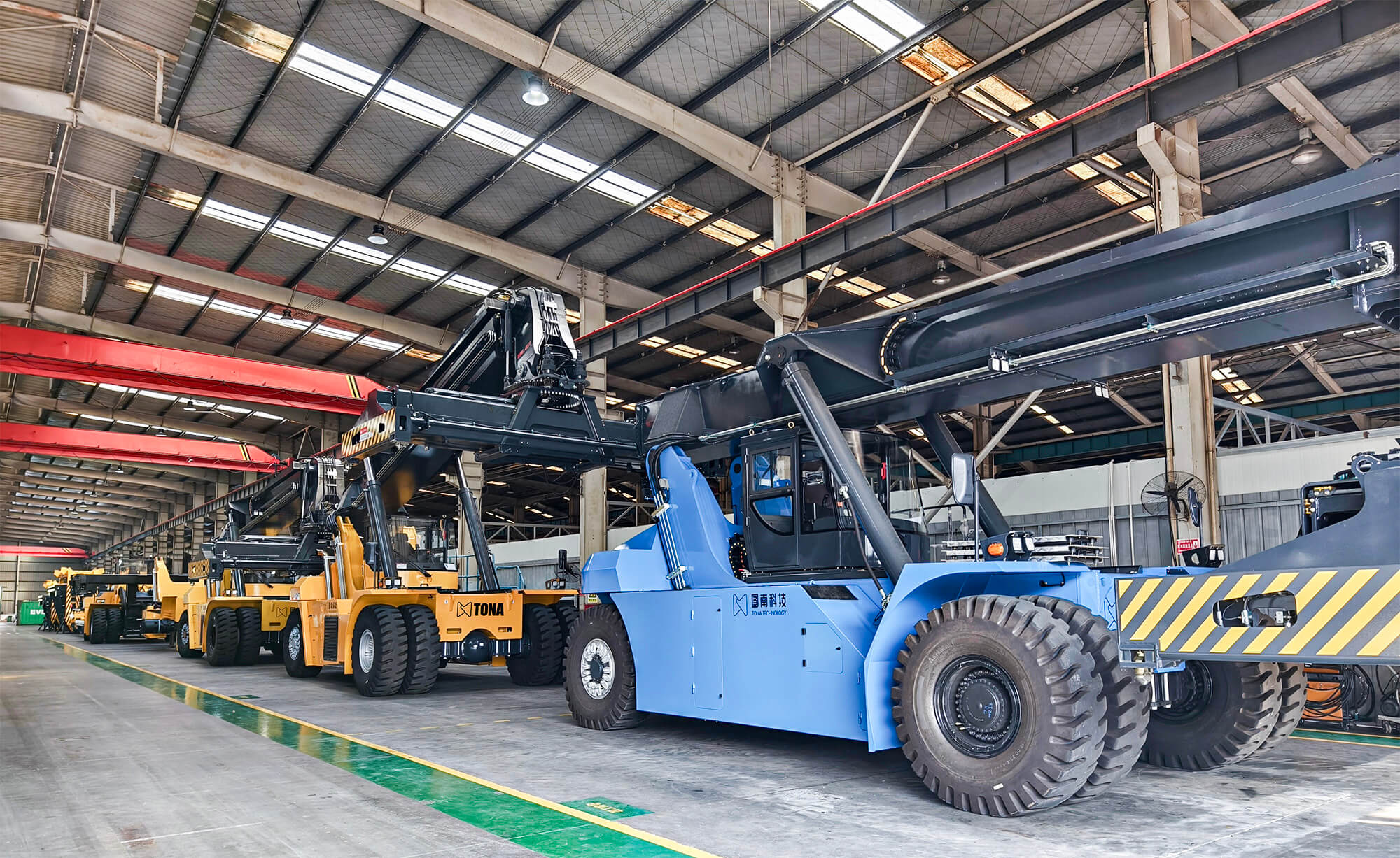 manufacturing container rotating spreader and reach stacker components